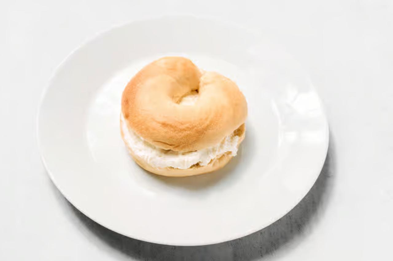 Bagel and cream cheese schmear at Benny's Bagels Dallas TX