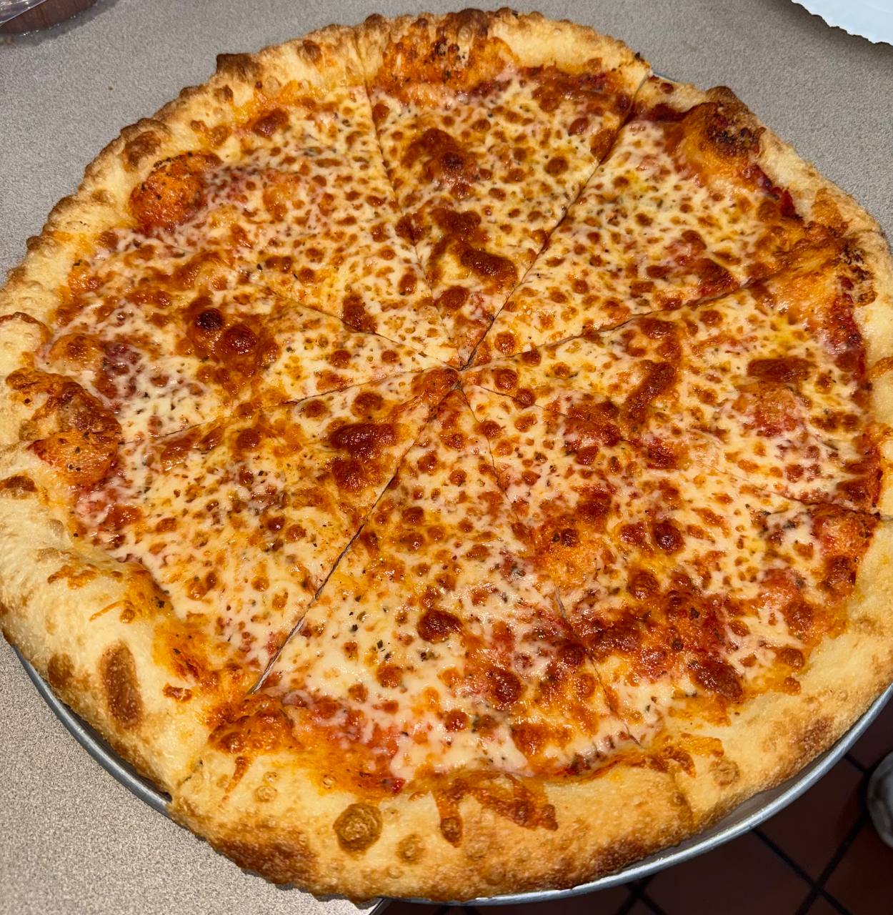 Kosher supreme pizza at Benny's Bagels Dallas TX
